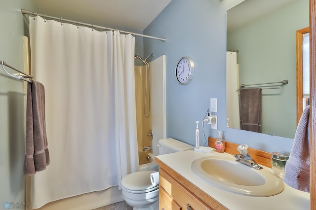 full bathroom with shower / tub combo, vanity, and toilet