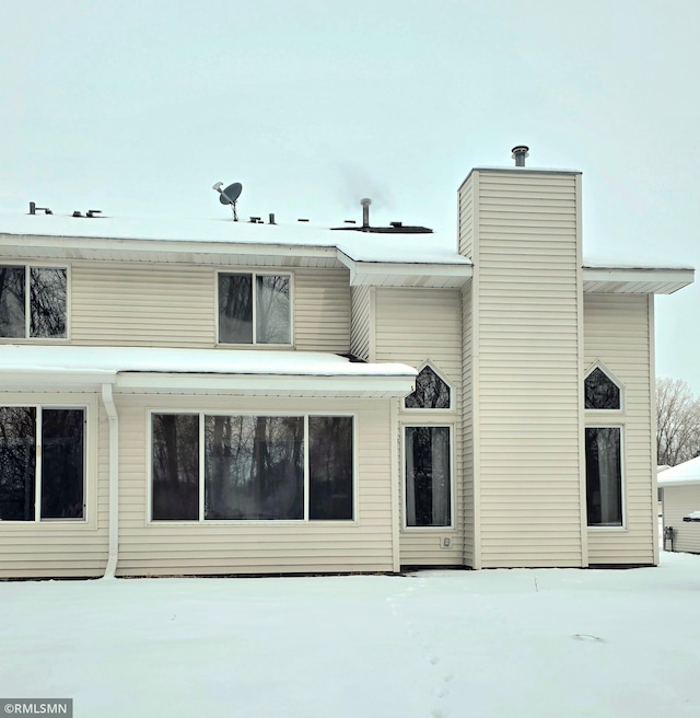 view of snow covered property