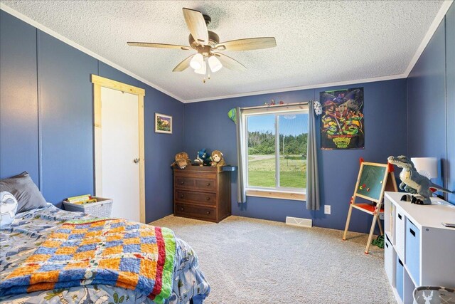 bedroom with visible vents, a ceiling fan, a textured ceiling, carpet flooring, and crown molding