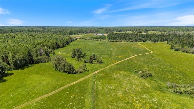 aerial view featuring a view of trees