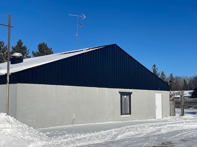 view of snow covered property