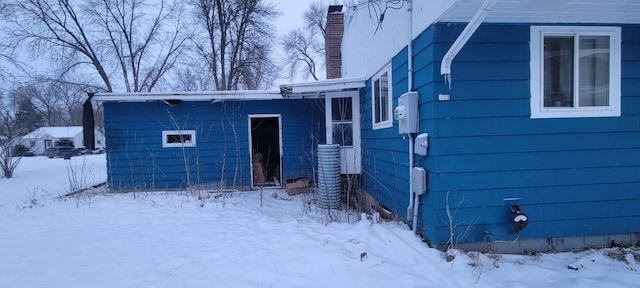 view of snow covered property