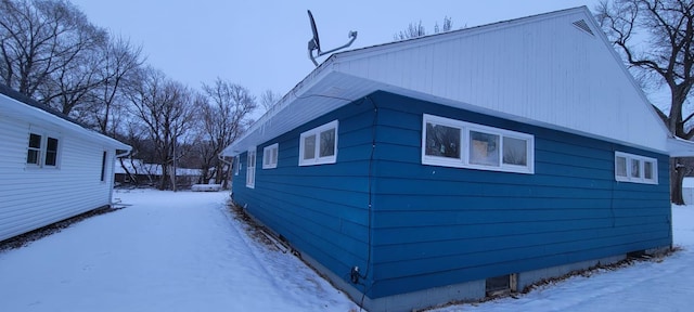 view of snow covered property