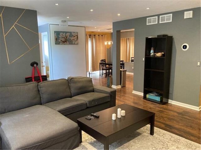 living room with hardwood / wood-style floors