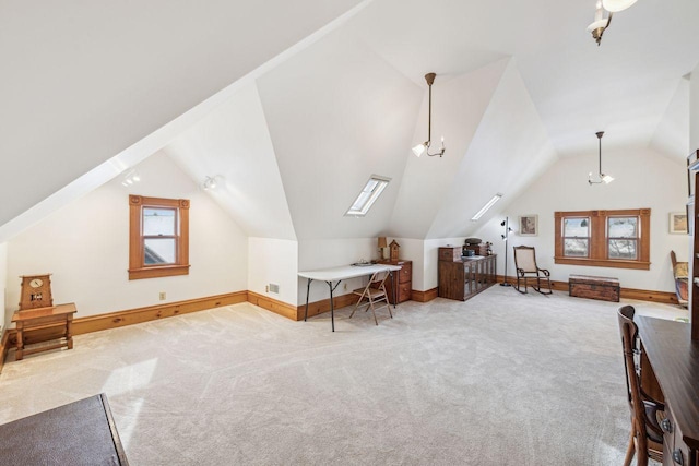 bonus room with lofted ceiling, a wealth of natural light, and carpet floors