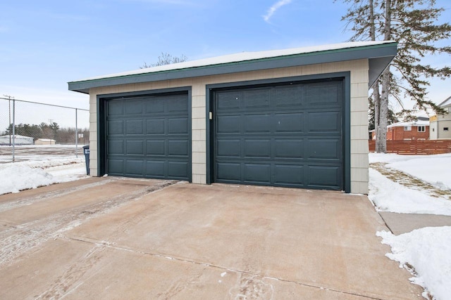 view of snow covered garage