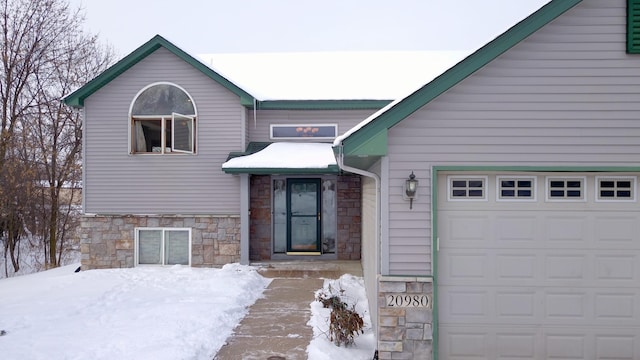 view of front of house with a garage