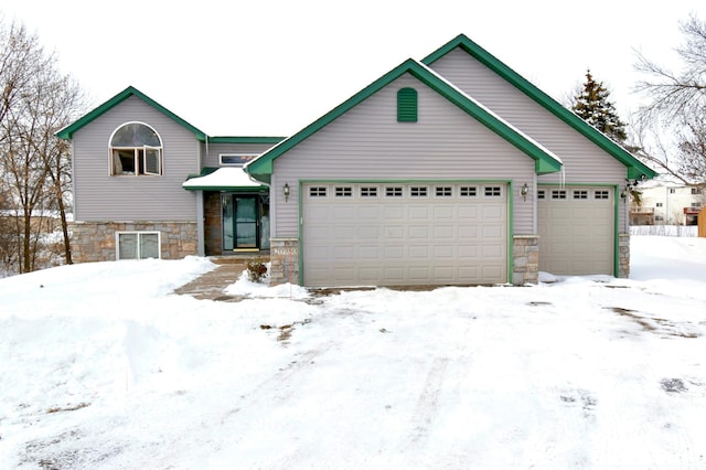 view of front of home with a garage