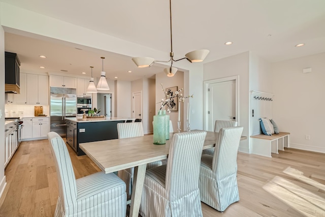 dining space featuring light hardwood / wood-style flooring