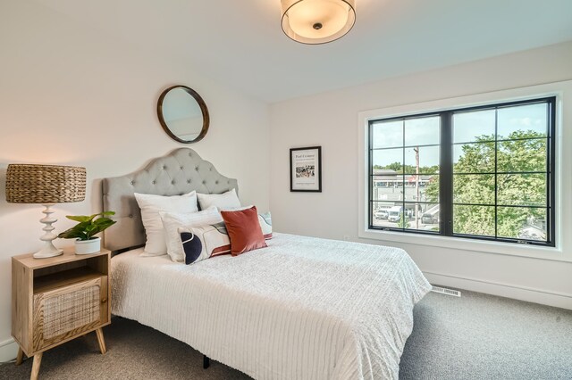 bedroom featuring carpet