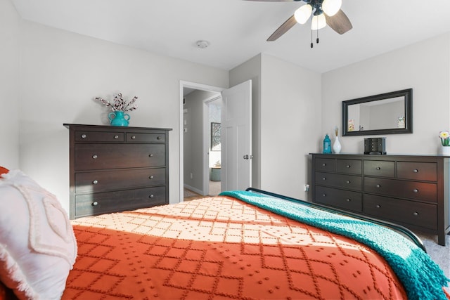 bedroom featuring ceiling fan and carpet flooring