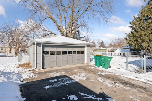 view of snow covered garage