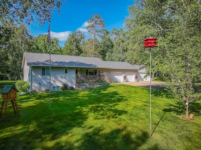 single story home featuring an attached garage and a front lawn