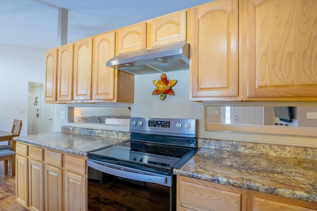 kitchen with wood finished floors, black range with electric stovetop, under cabinet range hood, and light brown cabinetry