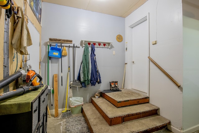 interior space featuring baseboards