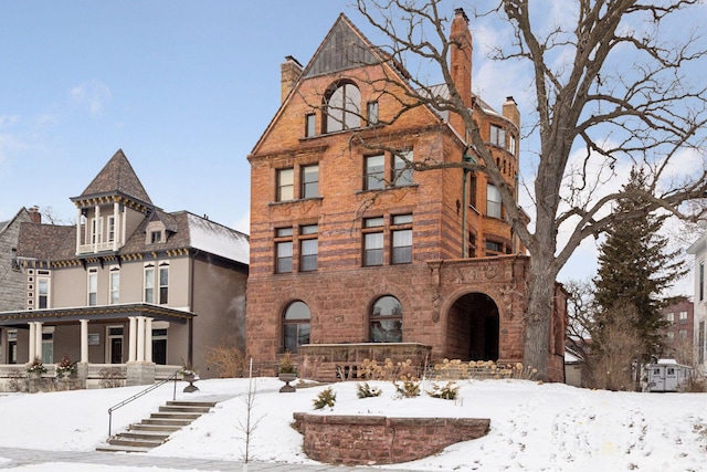 view of snow covered property