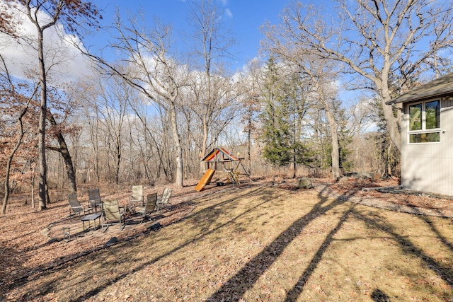 view of yard featuring a playground