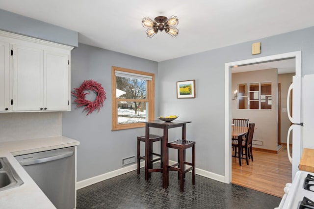 dining room with baseboards