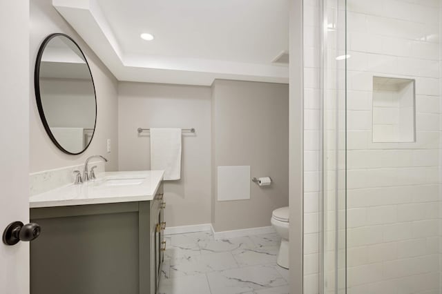 bathroom featuring marble finish floor, recessed lighting, toilet, vanity, and baseboards