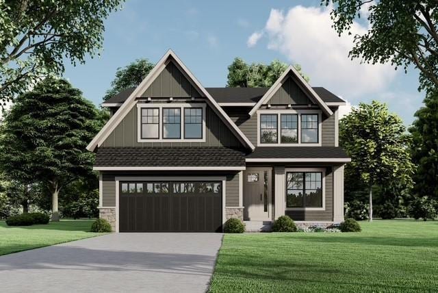 craftsman-style house featuring a garage and a front yard