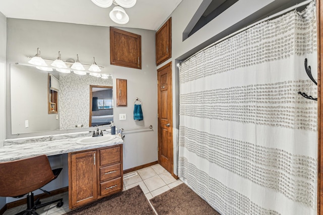 bathroom with vanity and tile patterned flooring