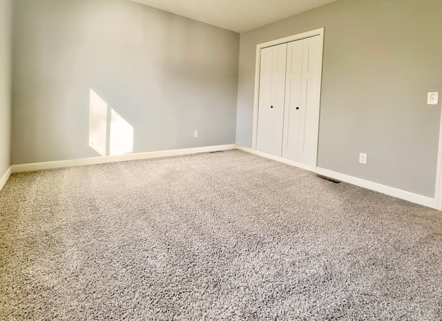 unfurnished bedroom with a closet