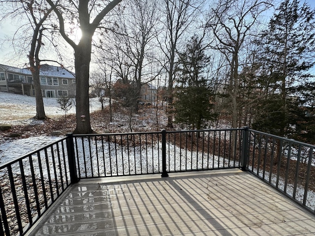 view of snow covered deck