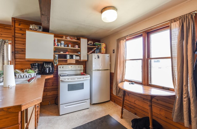 kitchen featuring sink and white appliances