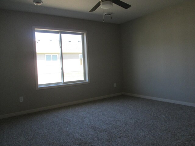 426 Fawn Run, Kenyon, MN 55946 - unfurnished room with carpet flooring, ceiling fan, and a smoke detector
