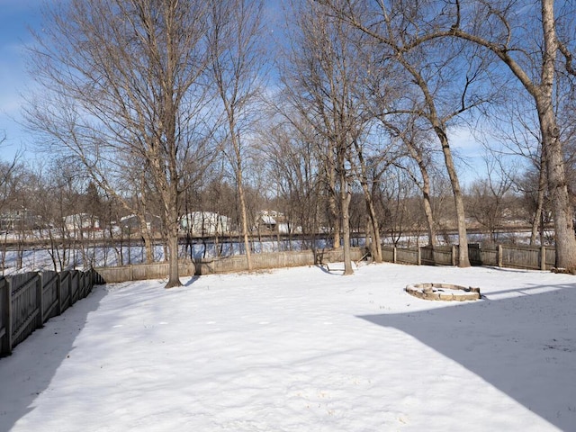 view of yard covered in snow