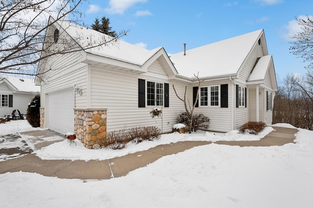 exterior space with a garage