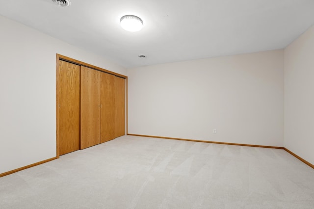 11767 36th Cir NE, Saint Michael, MN 55376 - unfurnished bedroom with light carpet, baseboards, and a closet