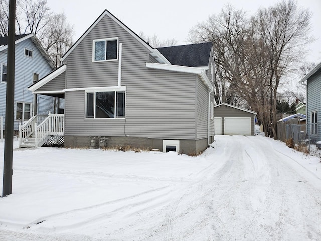 view of front of home featuring an outbuilding and a garage