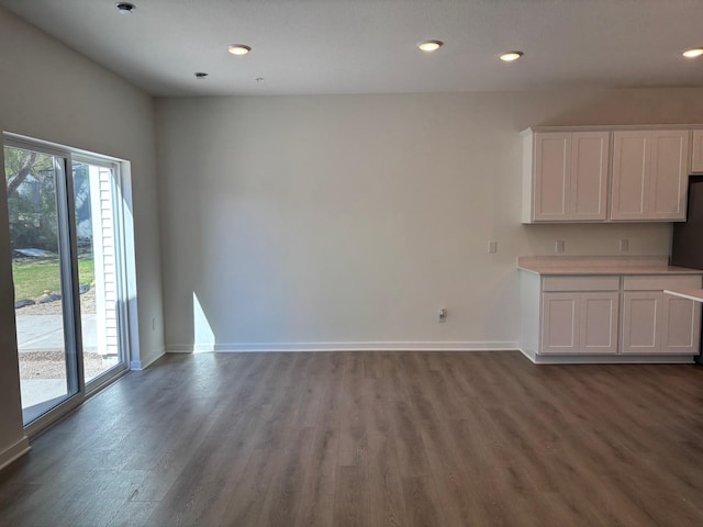 1779 Hauer Trl, Shakopee, MN 55379 - unfurnished living room featuring wood finished floors, baseboards, and recessed lighting