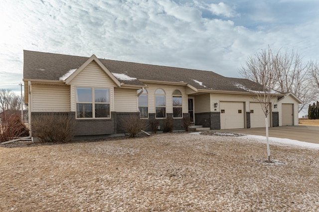 ranch-style home featuring a garage