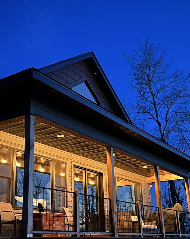 back of house with a porch