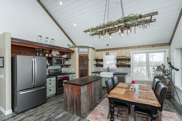 kitchen featuring open shelves, dark wood-style floors, wood counters, vaulted ceiling, and stainless steel appliances