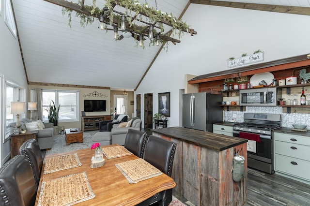 dining room featuring a notable chandelier, high vaulted ceiling, dark wood finished floors, wooden ceiling, and beamed ceiling