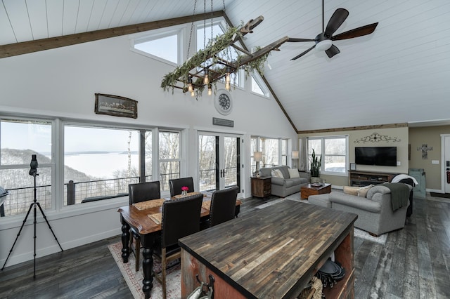 sunroom / solarium featuring french doors and beam ceiling