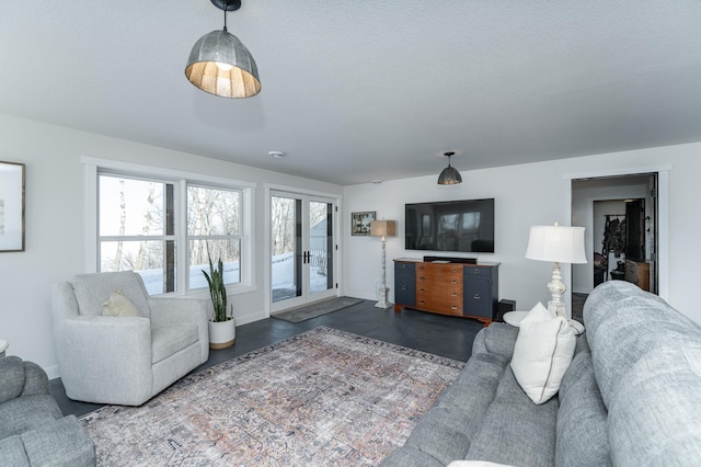 living room featuring baseboards