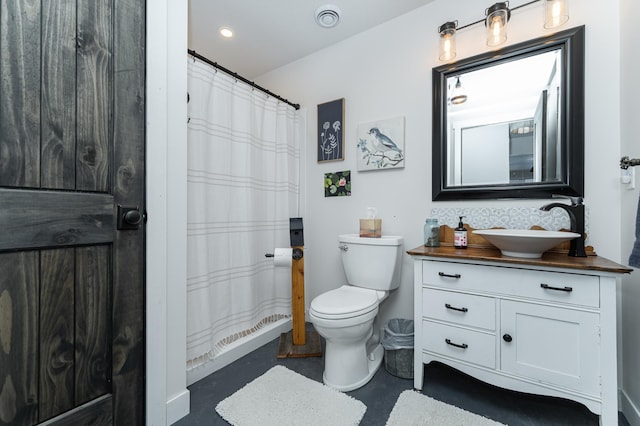 bathroom featuring vanity, visible vents, concrete flooring, toilet, and a shower with curtain