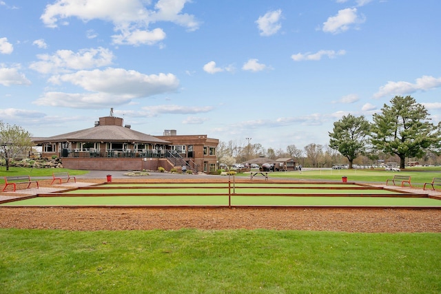 view of community featuring a lawn