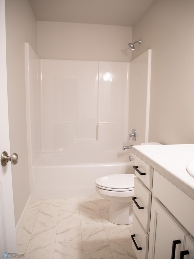 full bathroom featuring vanity, bathing tub / shower combination, and toilet