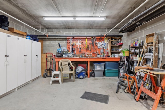 garage with a workshop area