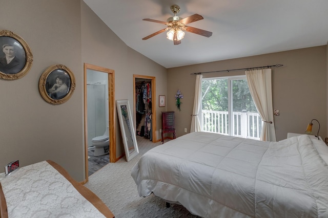 carpeted bedroom with ensuite bath, access to outside, a spacious closet, vaulted ceiling, and a closet