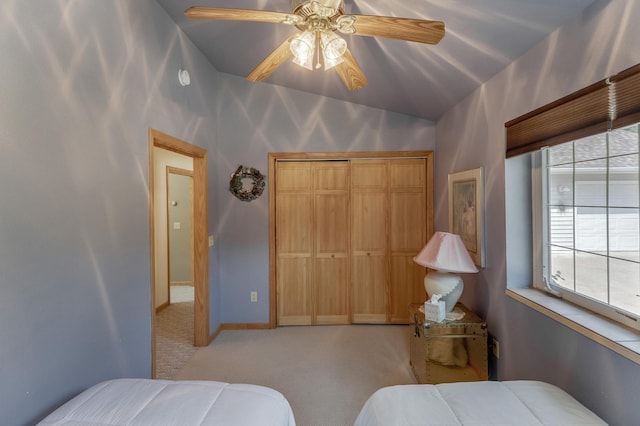 bedroom with light colored carpet, a closet, and ceiling fan