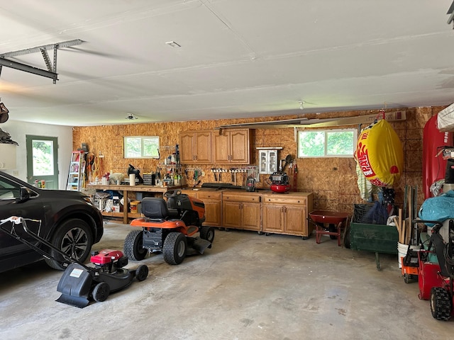 garage with a workshop area