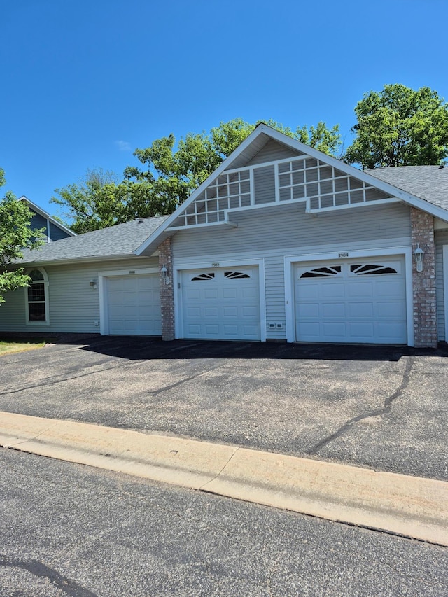 1902 Tiffany Cove Ln SW, Rochester, MN 55902 - garage with driveway