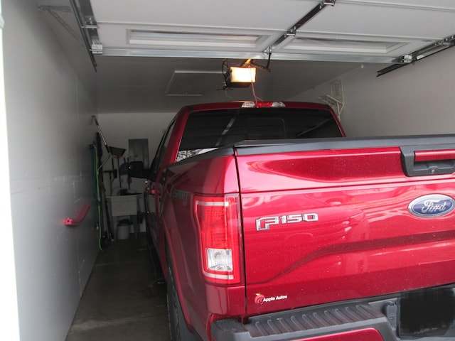 1902 Tiffany Cove Ln SW, Rochester, MN 55902 - garage with a garage door opener