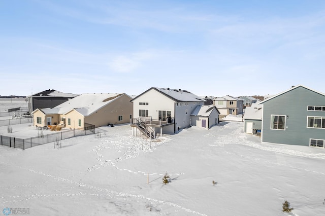 view of snow covered property